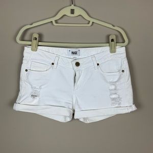 Paige distressed white jean shorts 27